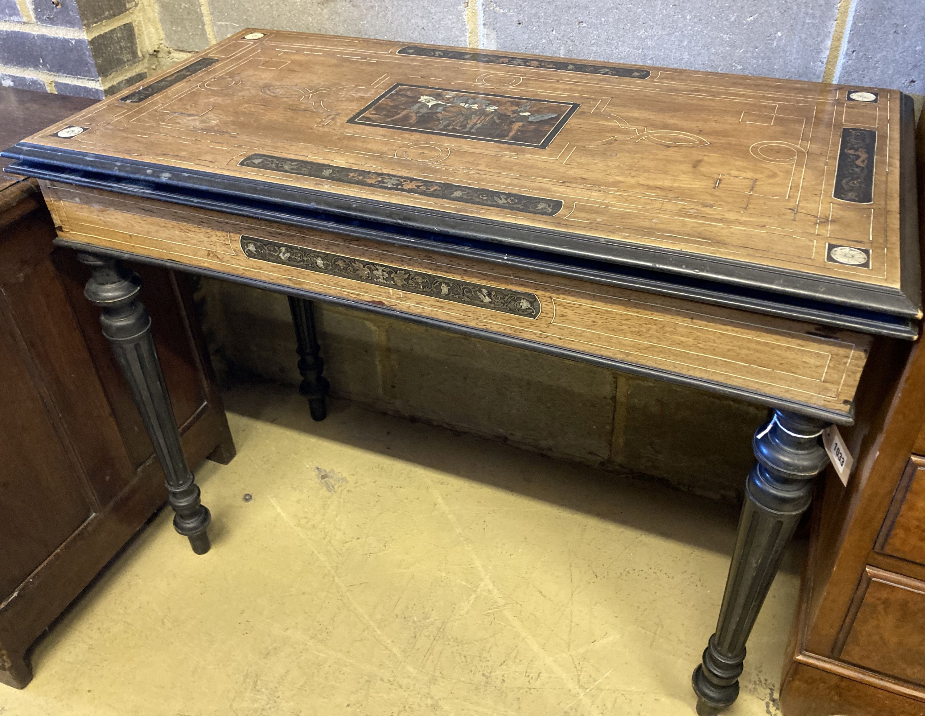 A 19th century Italian inlaid walnut and ebonised card table with folding top (faults), width 94cm, depth 47cm, height 75cm